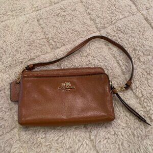 Coach leather wristlet,  amber color